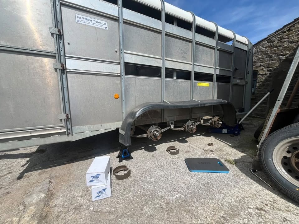 Trailer axle stripped down for servicing by Peak Trailers