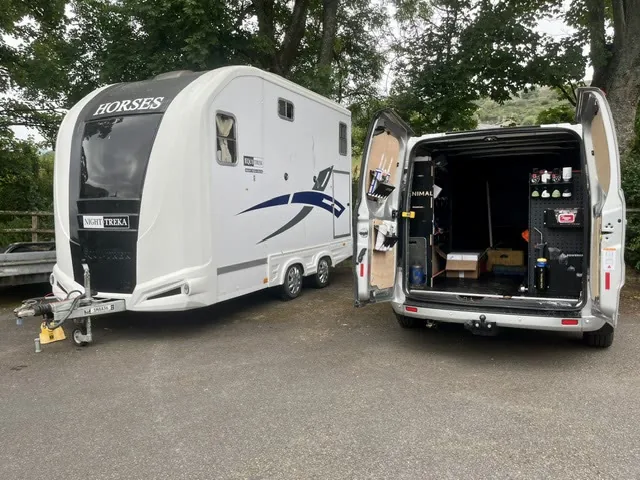 Peak Trailers mobile service van opened up alongside a horsebox on site