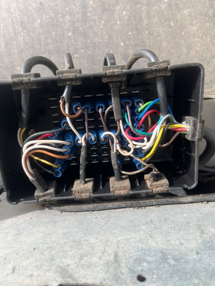 Trailer light board and wiring being repaired